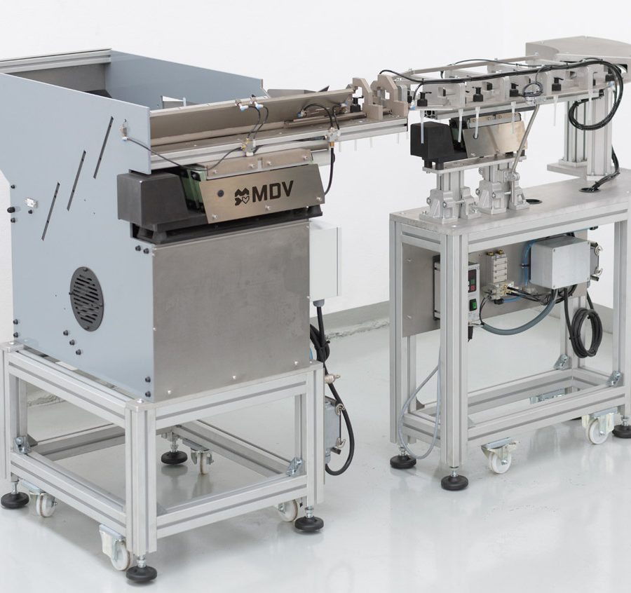 Escalator – Posicionador de piezas motorizado para dosificadores