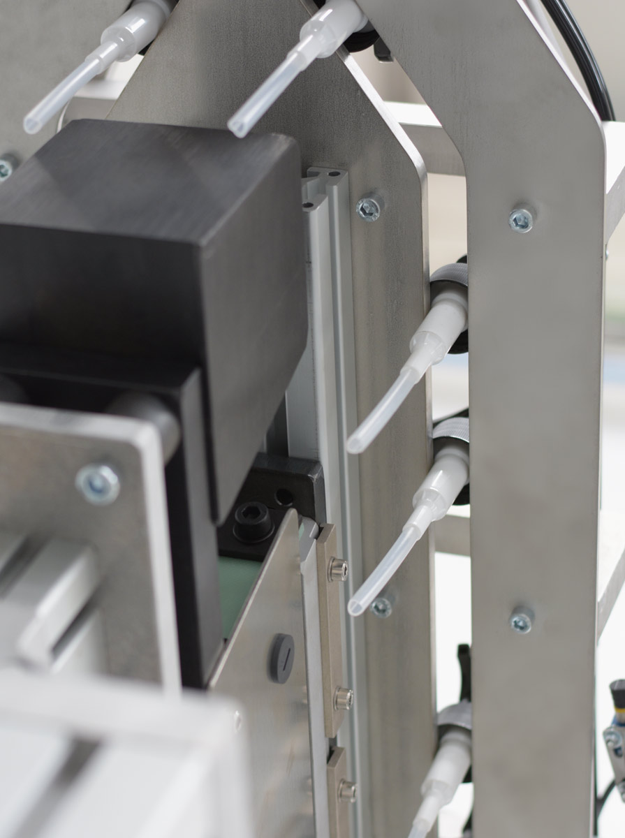 Escalator. Sistema industrial mecanico por elevacion de lamas para el posicionamiento automatizado de dosificadores vista inferior