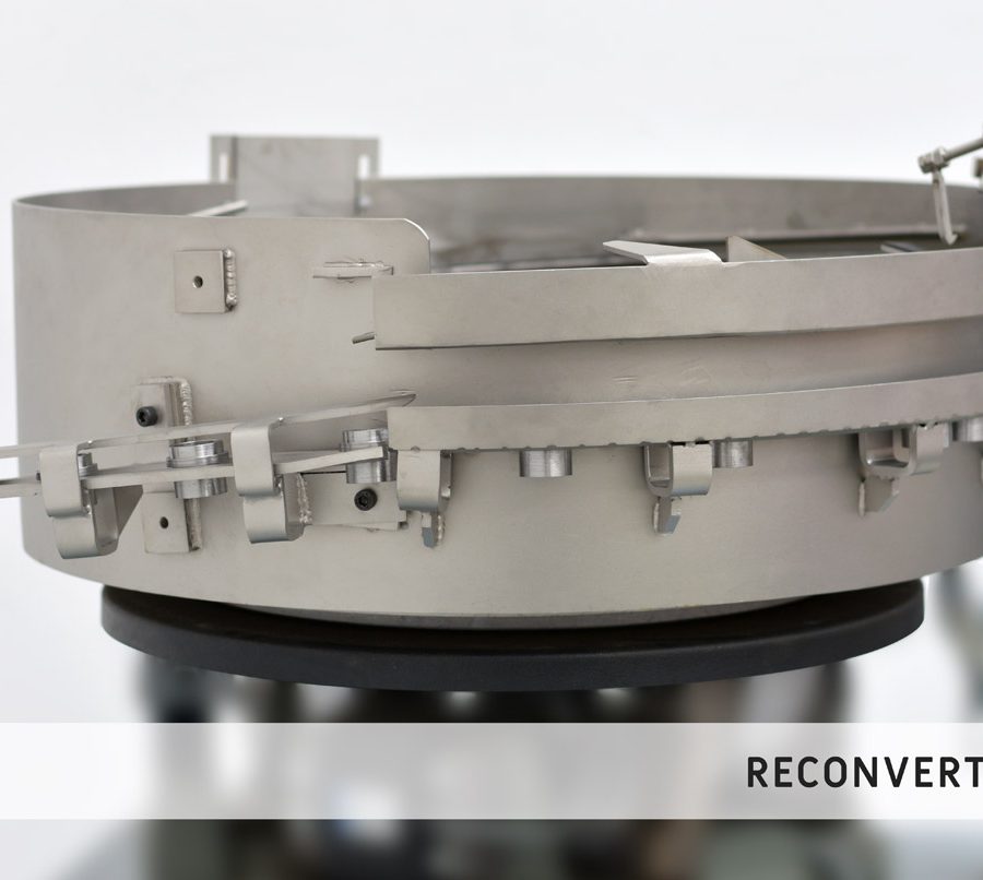 Reconversión de posicionador vibratorio con doble canal y utillajes de salida intercambiables