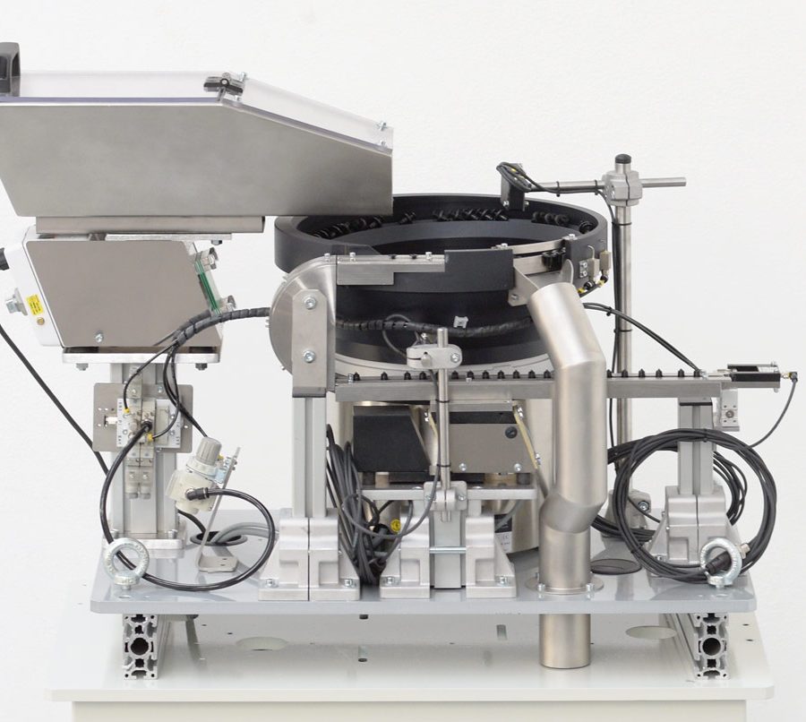 Posicionador vibrador con paso a paso para clips agrafe