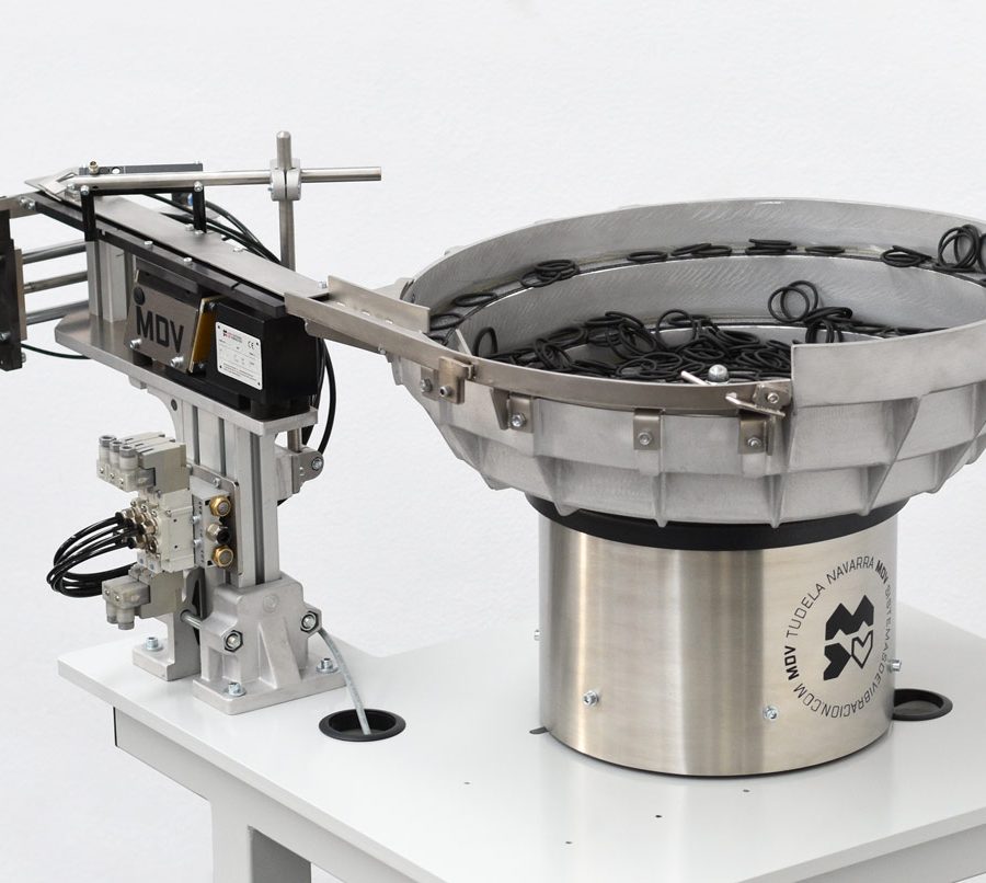 Posicionador vibrador con sistema paso a paso