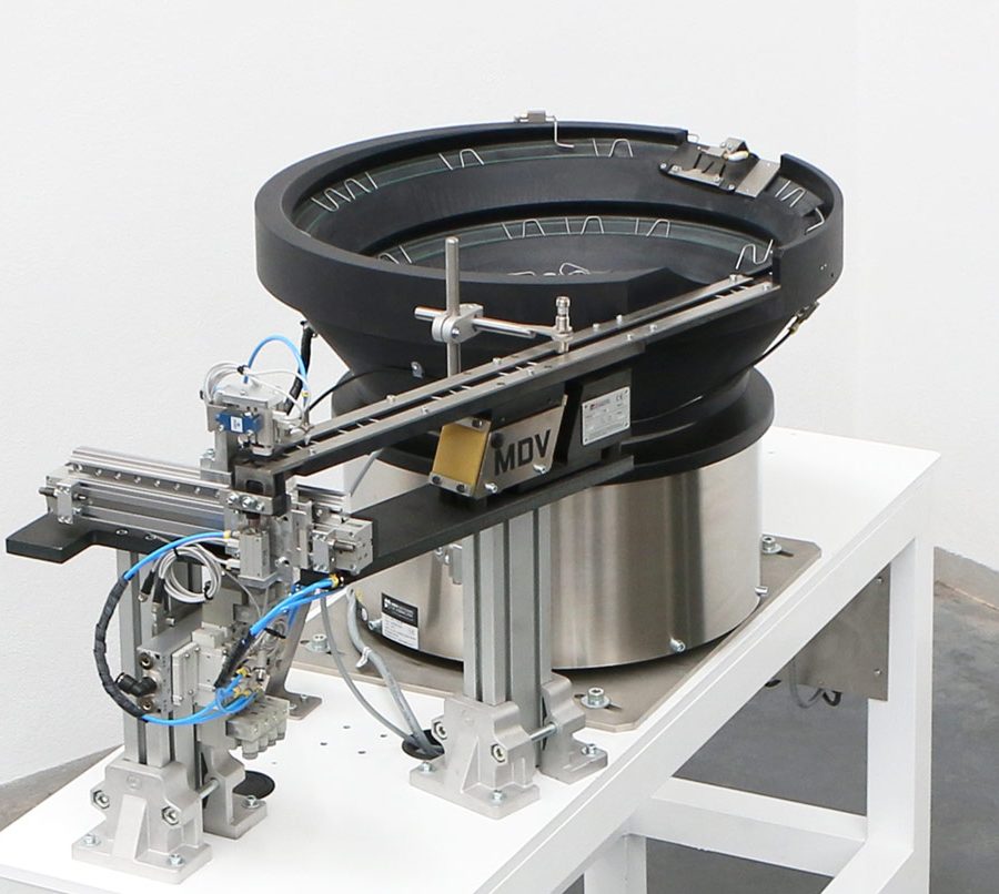 Vibrador posicionador con tolva de fibra