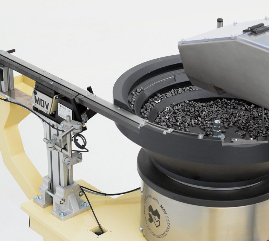 Posicionador vibratorio para piezas múltiples