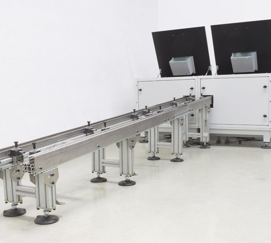 POSICIONADOR SIMÉTRICO VIBRATORIO CON DOBLE PUNTO DE RECOGIDA Y DOS SALIDAS