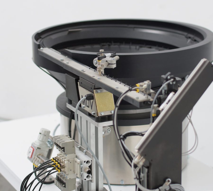 Posicionador vibrador con sistema paso a paso