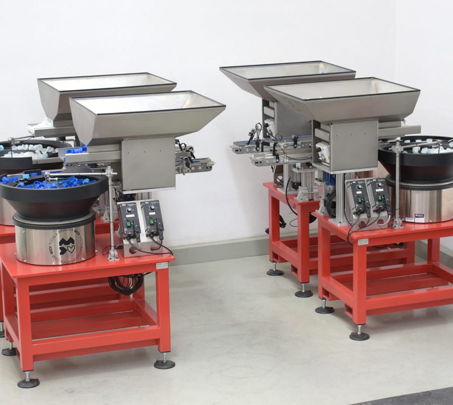 Conjunto simétrico de posicionadores vibradores para tapones de seguridad