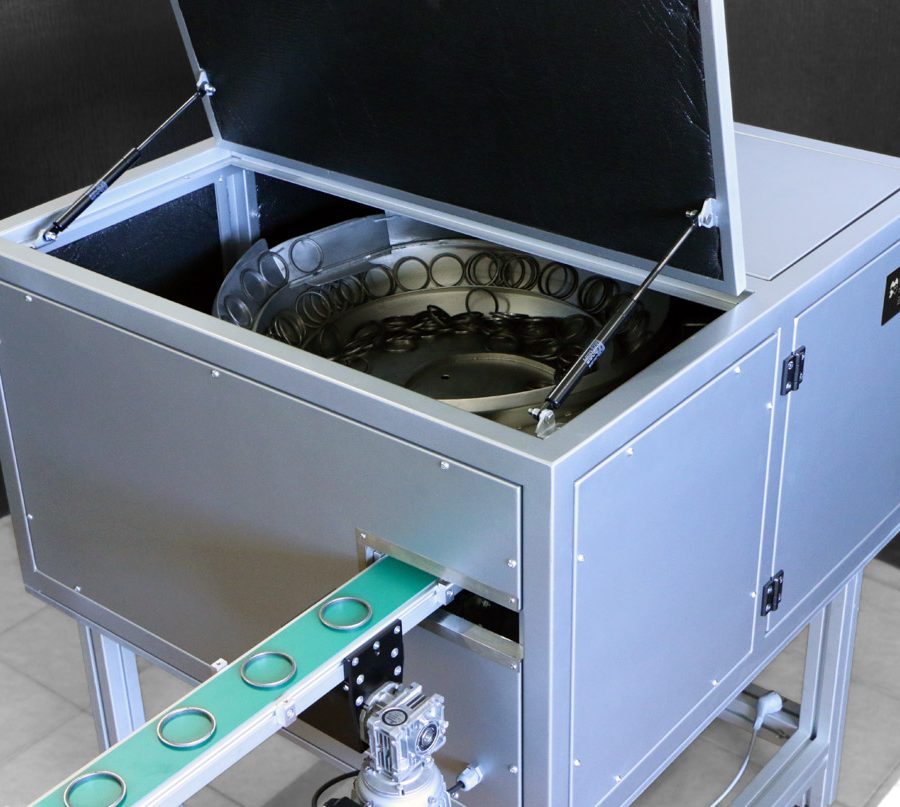 Vibrador para posicionamiento con tolva de acero