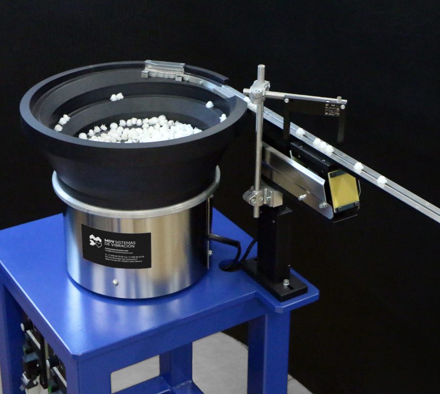 Sistema vibratorio con tolvas de fibra
