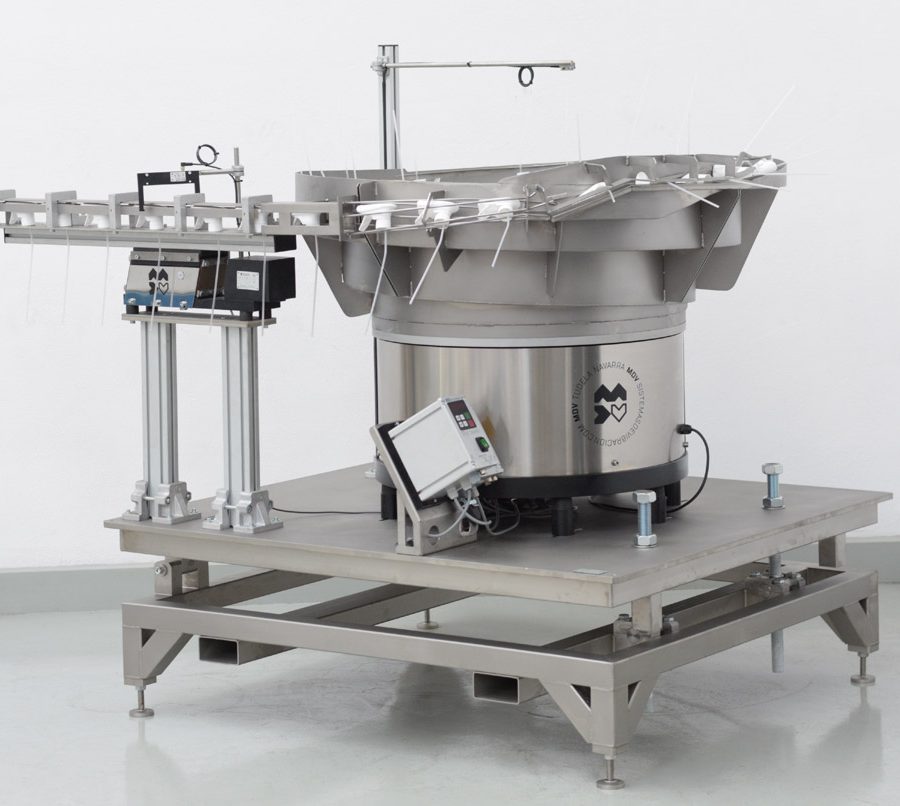 Posicionador vibratorio con cuba escalonada