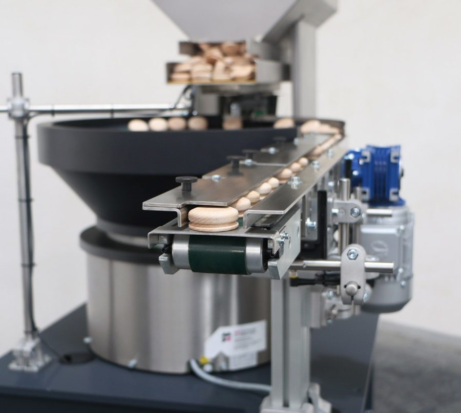 Posicionador industrial vibratorio con tolva de fibra