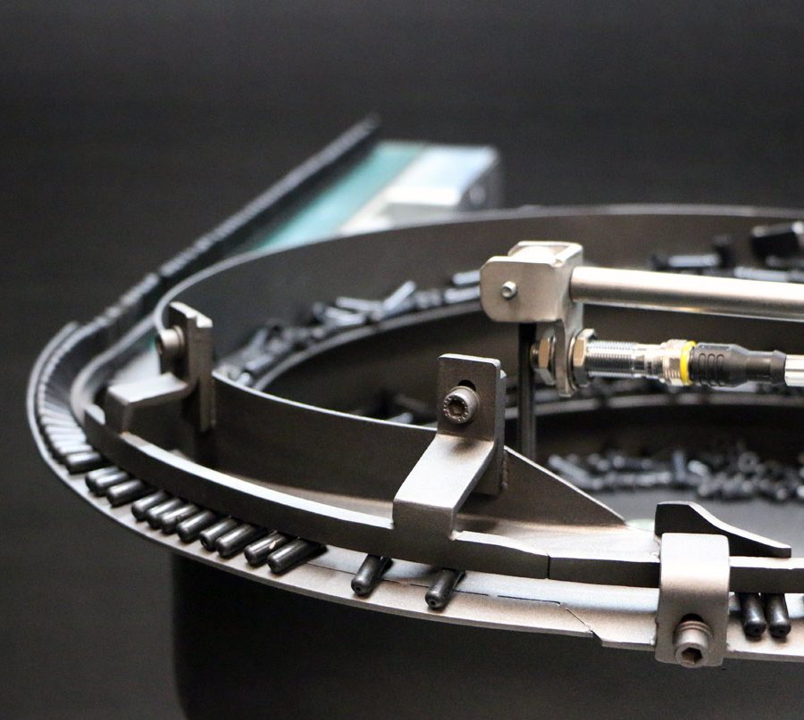 Vibrador para posicionamiento con tolva de acero